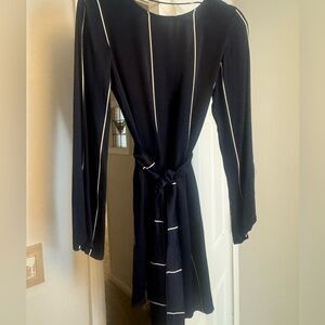 Faithful The Brand dress. Long sleeve with sash. Worn twice. Great condition.